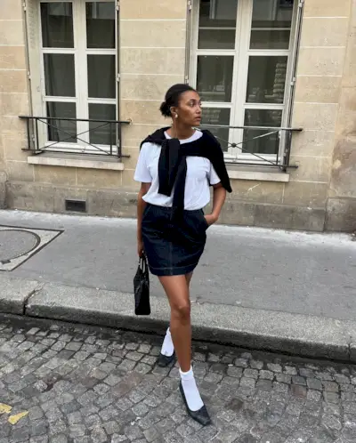 Lena in a denim mini skirt