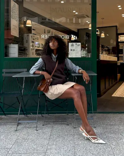 Emmanuelle in a skirt and heels