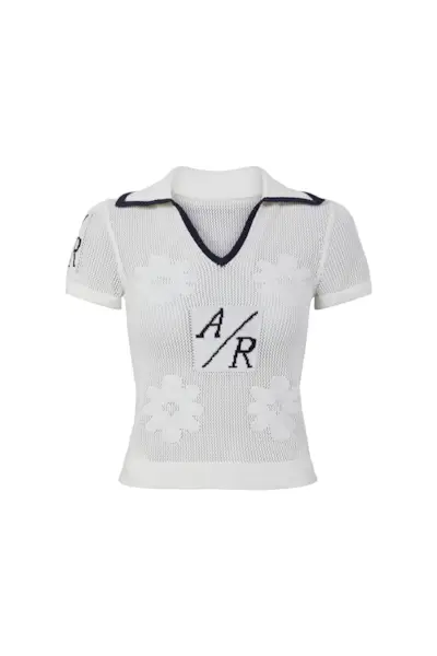 Woman wearing a basketball shorts outfit.