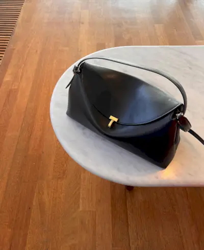 An image of @iliridakrasniqi carrying one of the most popular designer handbags.