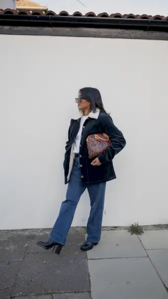 An image of @chiarasatelier carrying one of the most popular designer handbags.