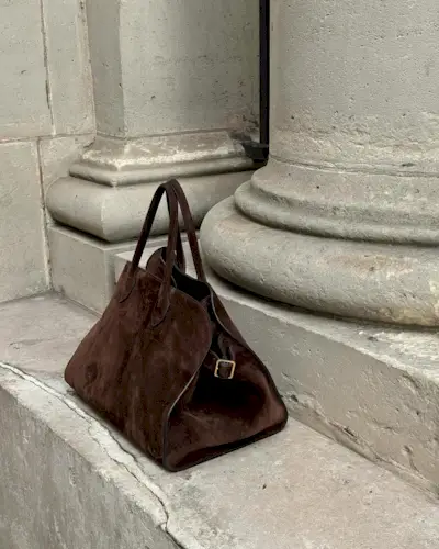 An image of @rikkekrefting carrying one of the most popular designer handbags.