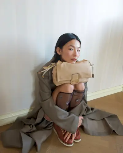 An image of @_yanyanchan wearing one of the most popular designer bags.