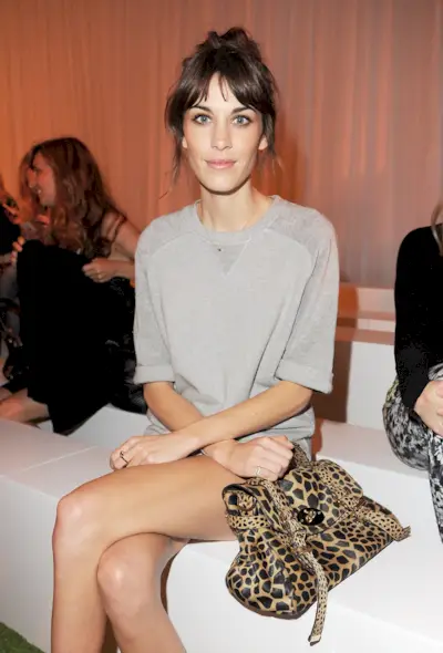 An image of Alexa Chung wearing one of the most popular designer bags.