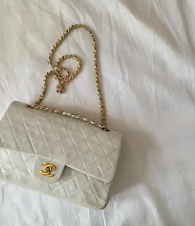 An image of @rikkekrefting carrying one of the most popular designer handbags.