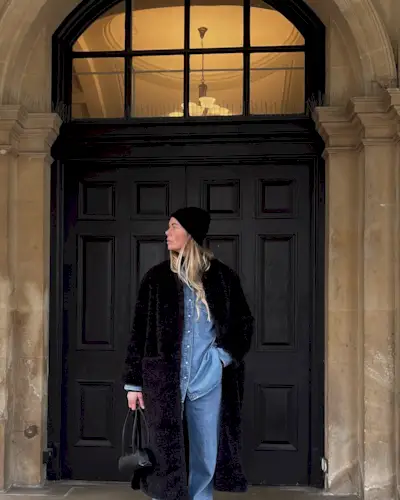 @samreid___ wears double denim with a faux fur coat