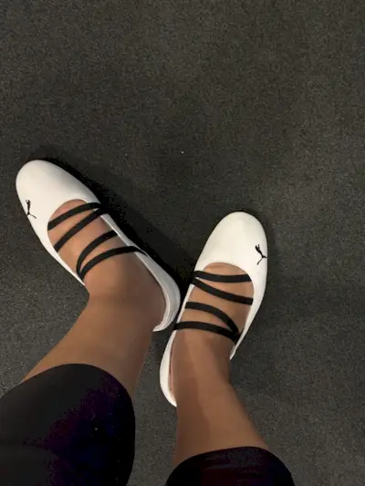 Editor Ana Escalante wearing Puma Sppeedcat ballet.