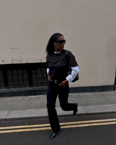 An image of @nlmarilyn wearing straight-leg trousers.