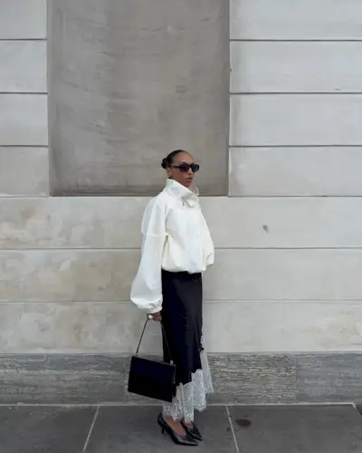 An image of @ingridedvinsen wearing a lace-trim skirt.