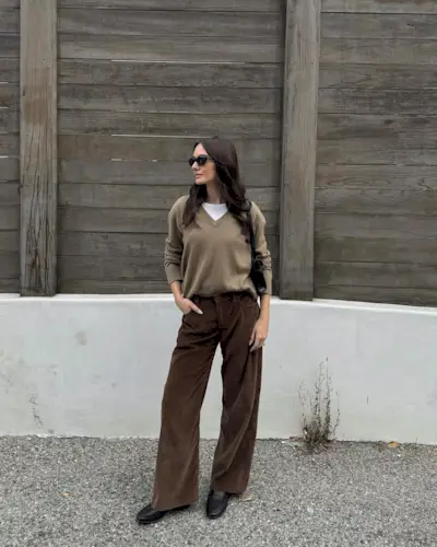Woman wearing wide-leg brown corduroy pants.