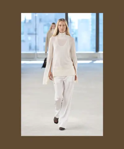 A brown backdrop with flashing images from the S/S 25 Toteme show, showcasing tights being styled with sandals for spring.