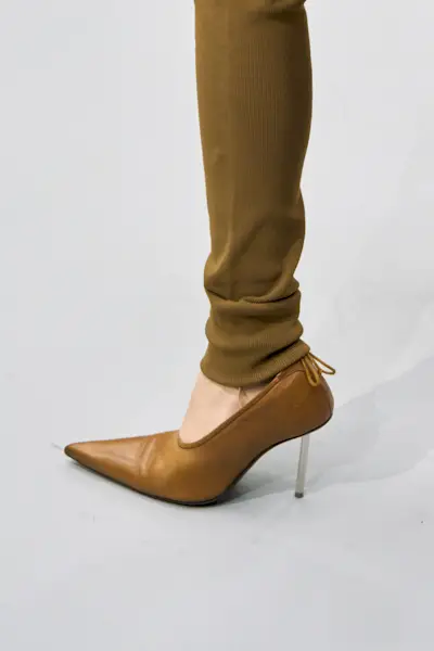 Tan brown shoes. These shoes are from the Acne clp F25 172 Runway show. This image was taken from Launchmetrics.