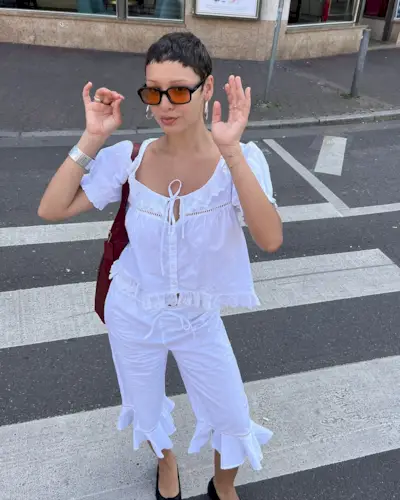 woman wearing all white outfit flutter pedal pushers summer 2025