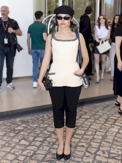 An image of Ariana Grande wearing one of the best capri pants for petites.