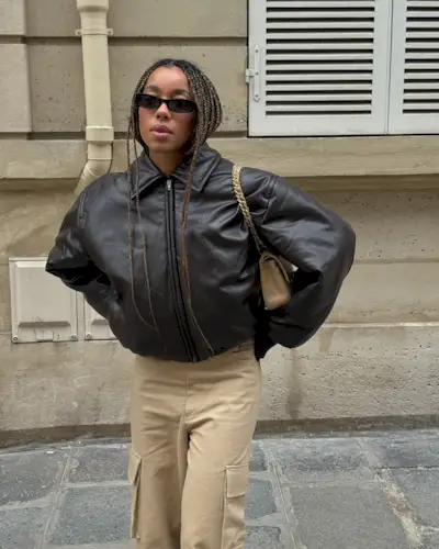 Influencer wearing a leather bomber jacket