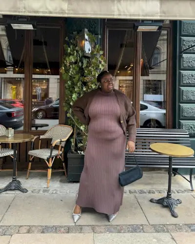 @abimarvel wears a brown dress and cardigan