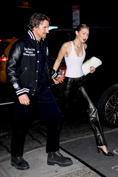 Gigi Hadid and Bradley Cooper arriving at her birthday party.