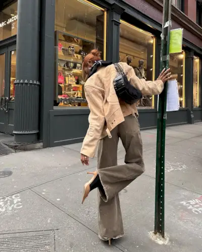 Woman wearing khaki denim trend 2025.