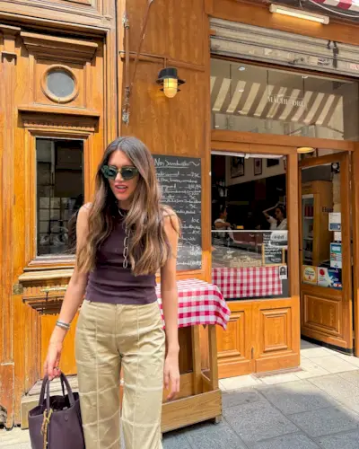 Woman wearing khaki pants trend 2025.