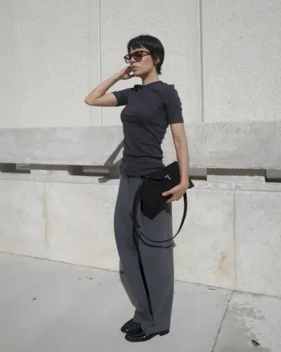 Influencer wearing an all-gray monochrome outfit.