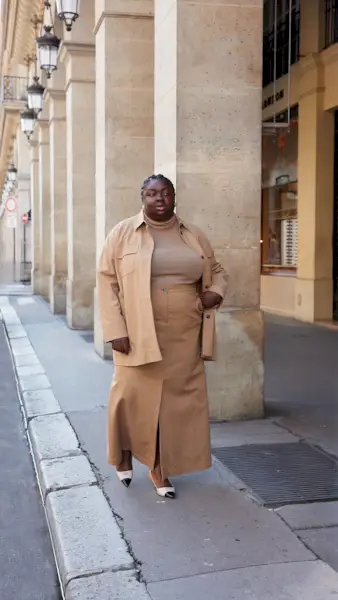 Abi Marvel wearing an all-camel monochrome outfit.