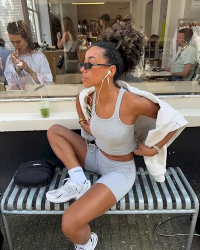 An image of @amaka.hamelijnck wearing an example of what clean girl aesthetic fashion looks like in 2025.