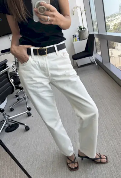 Woman in white Levi 501 jeans