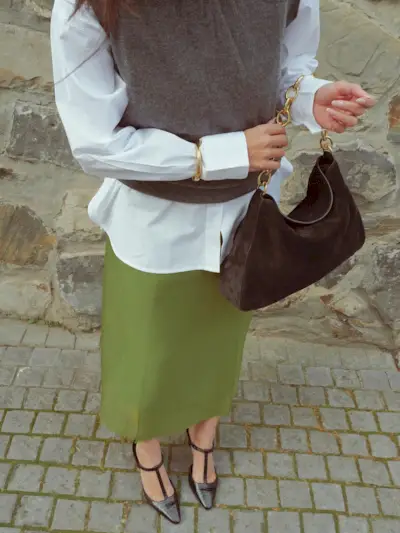 Influencer wearing t-strap heels.