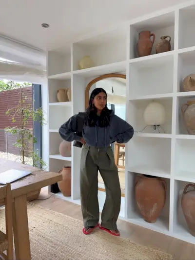 Monikh wearing red sandals