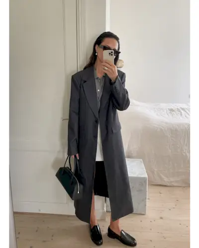 woman wearing fall loafer outfit idea 2025