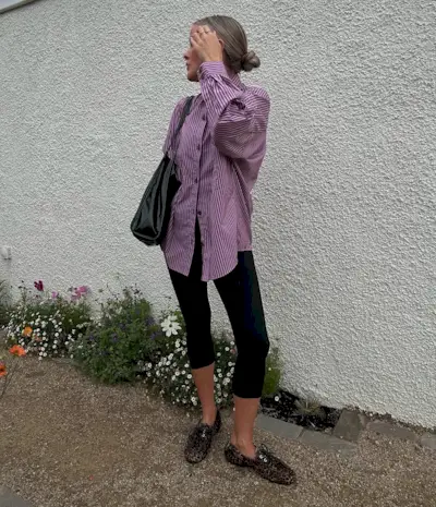 woman wearing fall loafer outfit idea 2025