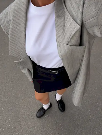 woman wearing fall loafer outfit idea 2025