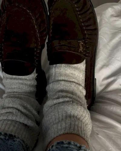 @hannahlewisstylist wears a pair of YSL loafers with marl grey socks