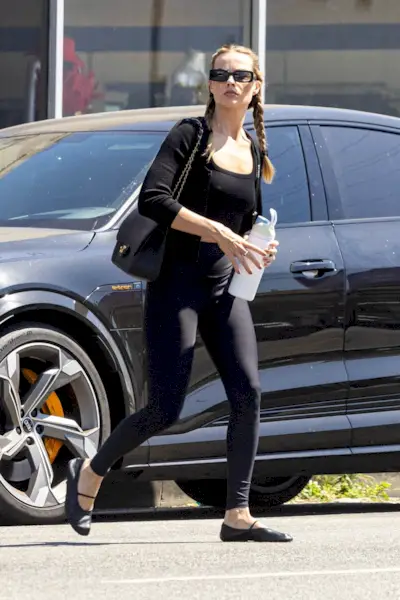 Margot Robbie wearing fall 2025 leggings outfit