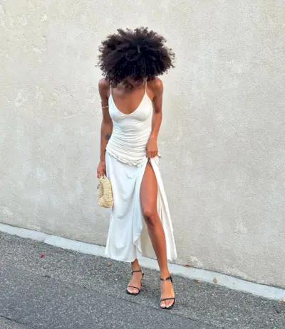 woman wearing white dress and black sandals