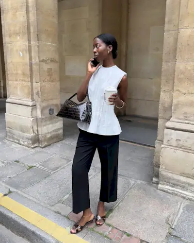 An image of @sylviemus_ wearing summer trouser trends.