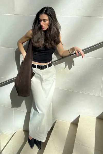 a photo showcasing one of the best summer work outfits with a woman wearing