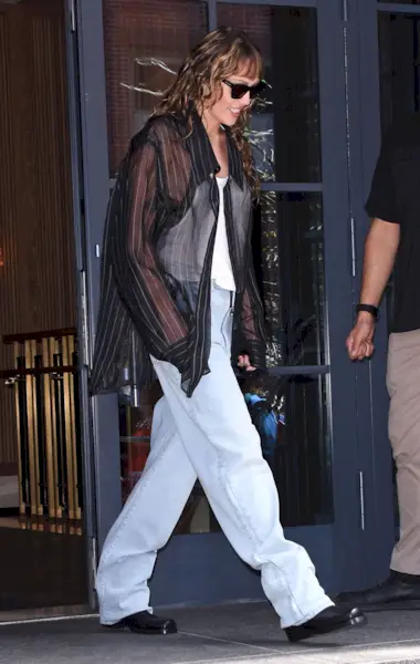 Miley Cyrus wears a sheer skirt look.