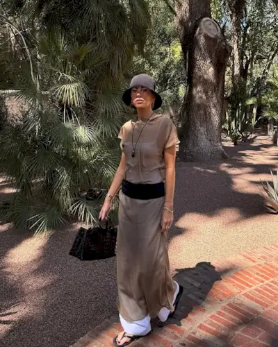 Hannah Lewis wears a sheer outfit.