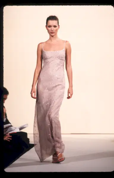 Kate Moss models clothing from the Marc Jacobs Spring 97 collection October 28, 1996 in New York City. Designer Marc Jacobs, who prompted the grunge trend, became a worldwide name to fashion when he joined Louis Vuitton as Artistic Director. (Photo by Evan Agostini/Liaison)