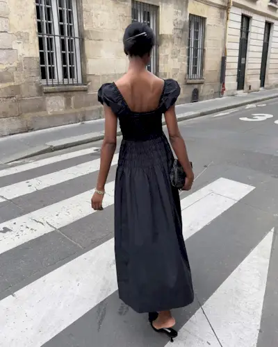 @sylviemus_ wearing black dress and mules