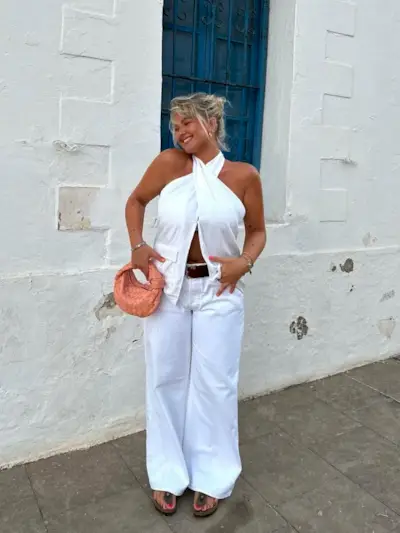 best petite fashion brands @gracealexandriaa wearing white top and H&M white trousers
