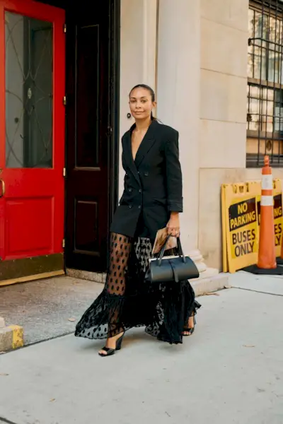 Woman wearing lace clothing during NYFW S/S 26.
