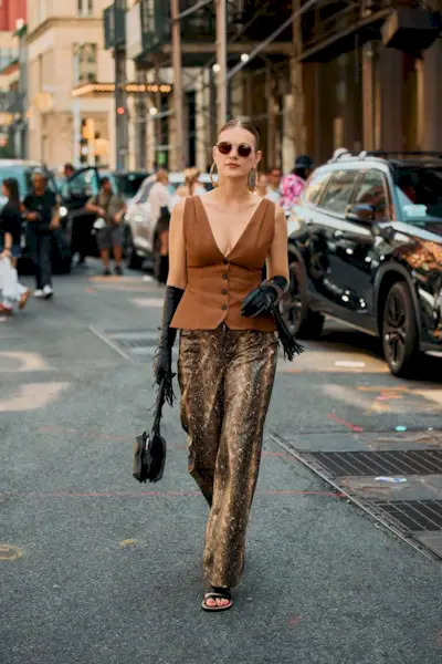 Woman wearing animal print clothing during NYFW S/S 26.
