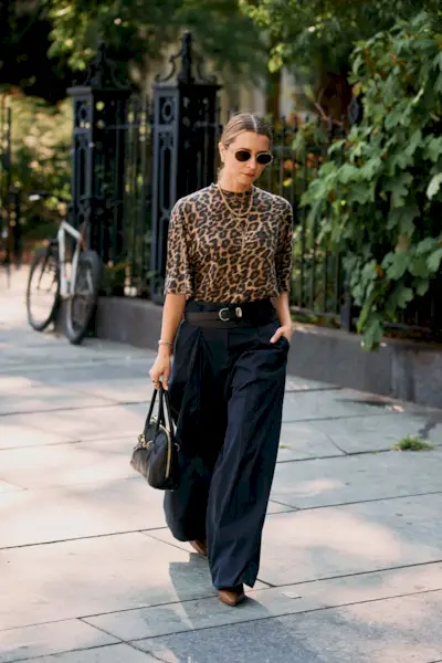 Woman wearing animal print clothing during NYFW S/S 26.