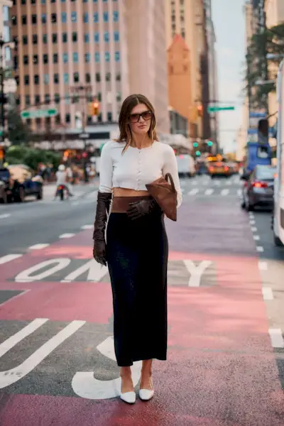 Woman wearing a column skirt during NYFW S/S 26.