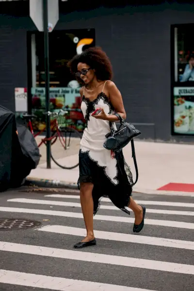 Woman wearing lace clothing during NYFW S/S 26.
