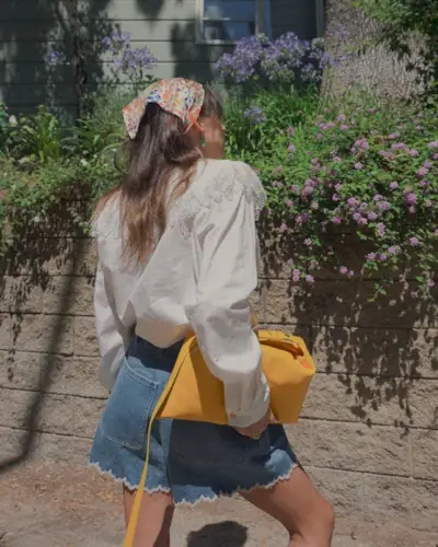 Woman wearing a cottagecore outfit.