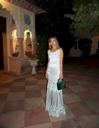 @arentyoueshita wears a blue, lace-trimmed Indian wedding guest outfit